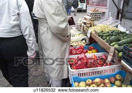 Shoppers for produce at the Balucki Rynek market View Large Photo Image Stock Image - Shoppers for produce at the Balucki Rynek market. Fotosearch