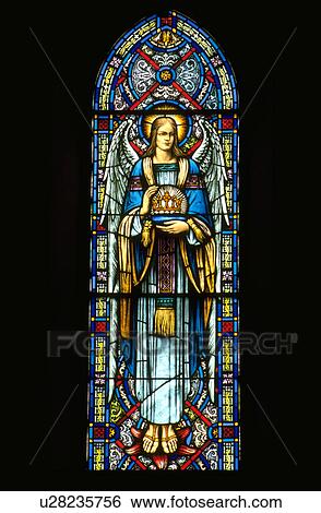 Stock Photograph - Angel holding crown stained glass window. Fotosearch
