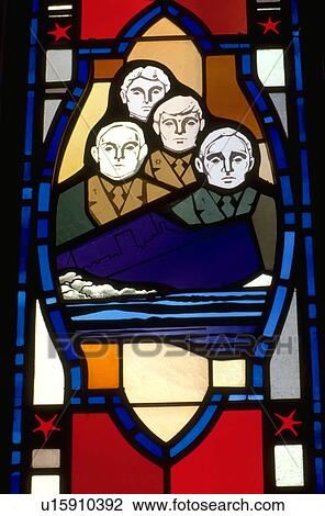 Stock Image - Four military men on sinking boat stained glass window. Fotosearch
