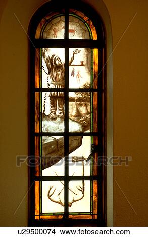 Picture - Native American with hands in the air stained glass window. Fotosearch