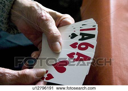 Aunt Fran age 92 playing with large print cards suffering from macular degeneration View Large Photo Image Stock Image - Aunt Fran age 92 playing with large print cards suffering from macular degeneration. Fotosearch