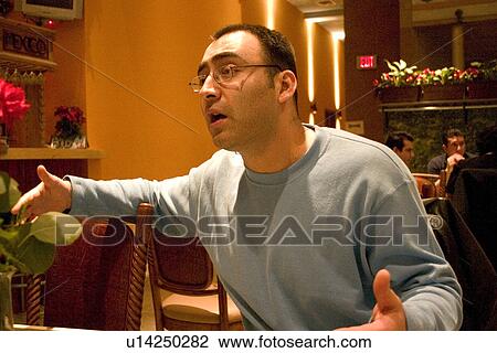 Stock Image - Impassioned young man full of dreams and ambition. Fotosearch