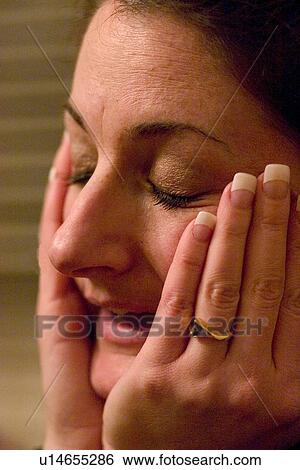 Stock Photograph - Woman age 36 stressed by the events of the day. Fotosearch