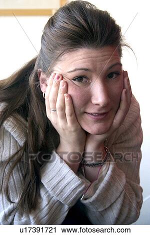Portrait of a happy woman age 27 at a family Christmas party View Large Photo Image Stock Image - Portrait of a happy woman age 27 at a family Christmas party. Fotosearch