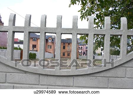 Several homes farmed behind a curved fence. Rawa Mazowiecka Central Poland View Large Photo Image Stock Photo - Several homes farmed behind a curved fence. Rawa Mazowiecka Central Poland. Fotosearch