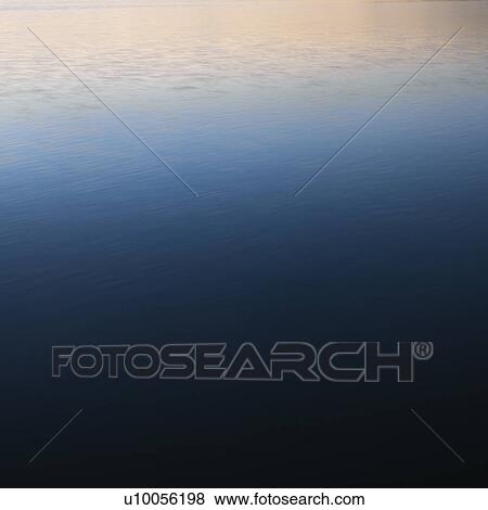 Calm blue water. View Large Photo Image Stock Photo - Calm blue water.. Fotosearch