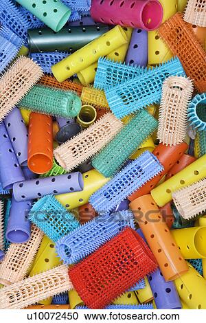Close-up of pile of hair curlers View Large Photo Image Stock Image - Close-up of pile of hair curlers. Fotosearch