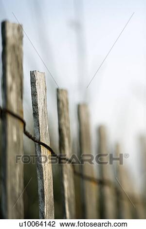 Image of wooden fence with rusted wiring View Large Photo Image Stock Image - Image of wooden fence with rusted wiring. Fotosearch