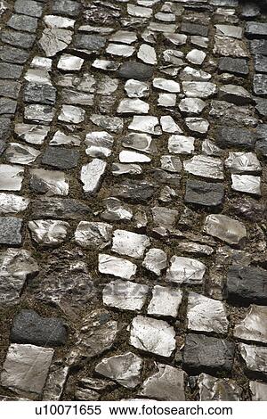Stone inlayed street in Lisbon, Portugal. View Large Photo Image Stock Photography - Stone inlayed street in Lisbon, Portugal.. Fotosearch