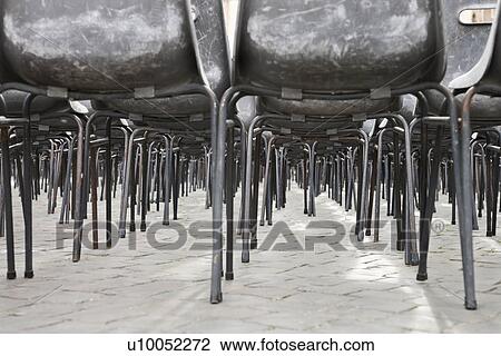 Worm's eye view of several chairs in Saint Peter's Square in Vatican City, Italy. View Large Photo Image Stock Image - Worm's eye view of several chairs in Saint Peter's Square in Vatican City, Italy.. Fotosearch
