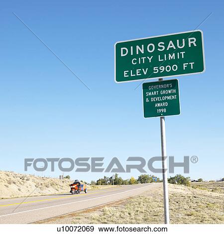 Stock Photo - City limit sign for city of Dinosaur, Colorado, . Fotosearch