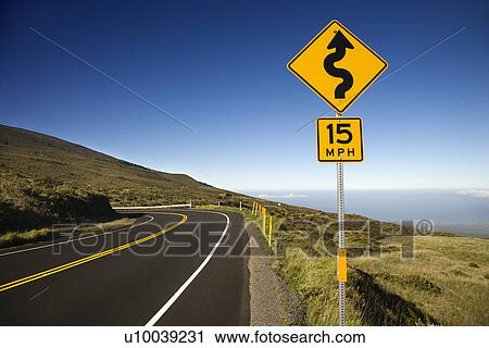 Stock Image - Curvy road sign in Haleakala National Park, Maui, Hawaii.. Fotosearch