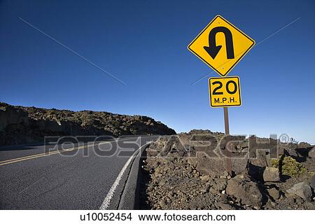 Road and curve in road sign in Haleakala National Park, Maui, Hawaii. View Large Photo Image Picture - Road and curve in road sign in Haleakala National Park, Maui, Hawaii.. Fotosearch