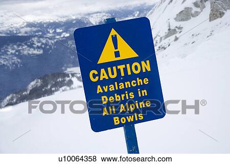 Snow ski resort caution sign on mountain side. View Large Photo Image Stock Photo - Snow ski resort caution sign on mountain side.. Fotosearch