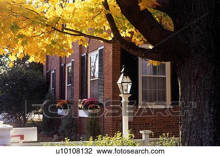 Stock Image - Home in Fall. Fotosearch