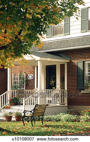 Stock Photo - Home in Fall. Fotosearch