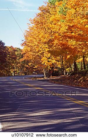 Stock Image - Road Scene in Fall. Fotosearch