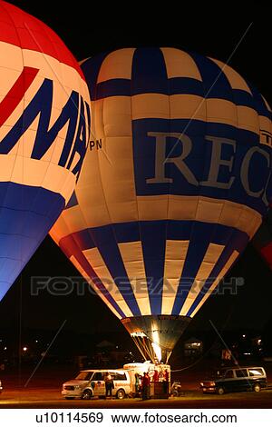 Stock Photo - Gatineau Hot Air Balloon Festival, Quebec Canada -night glow. Fotosearch