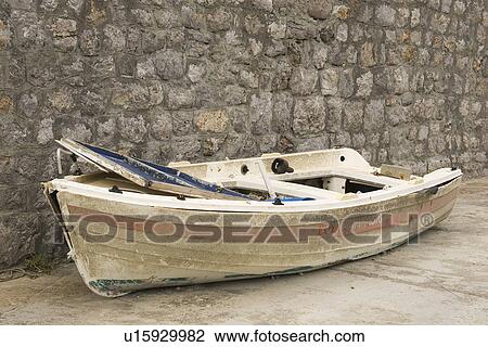 Stock Image - Boat, Day, Damaged, Abandoned. Fotosearch