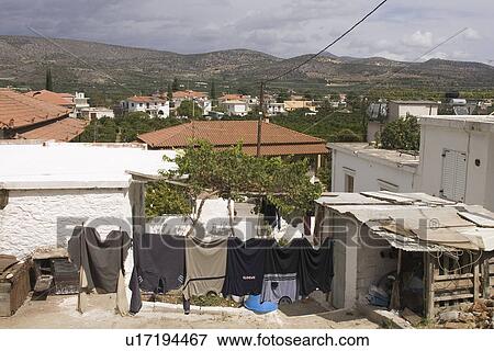 Stock Photo - Building Exterior, Building Structure, Clothesline, Clothing, Cloud. Fotosearch