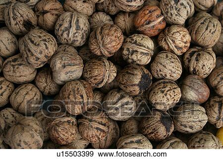 Stock Photo - walnuts, nuts, pile, heap, close-up, display. Fotosearch