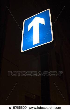 Stock Image - Arrow Sign, Direction, Blue, Black Background, Arrow. Fotosearch