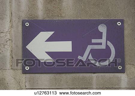 Stock Image - Blue, Disabled Sign, Disabled Parking Sign, Close-Up, Arrow Sign. Fotosearch
