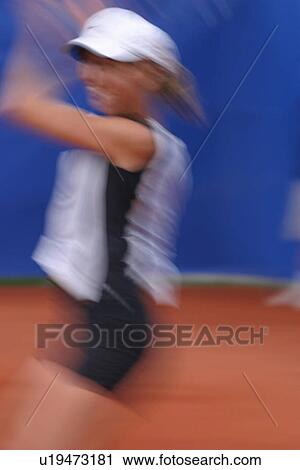 Stock Image - girl, young, young girl, sporty, sports, tennis. Fotosearch