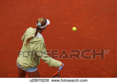 Stock Image - girl, young, young girl, sporty, sports, tennis. Fotosearch