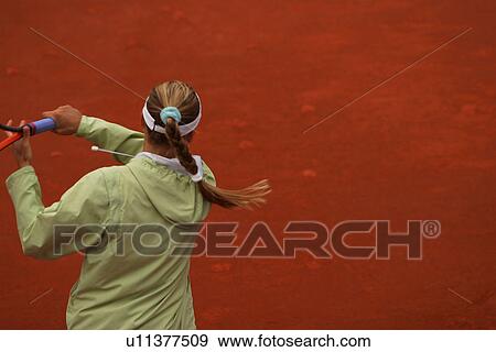 Stock Photo - girl, young, young girl, sporty, sports, tennis. Fotosearch