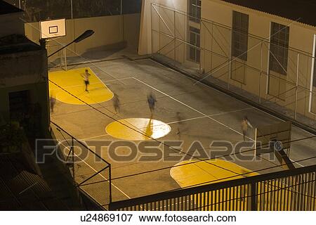 Stock Photo - group of people, athletics, basketball. Fotosearch
