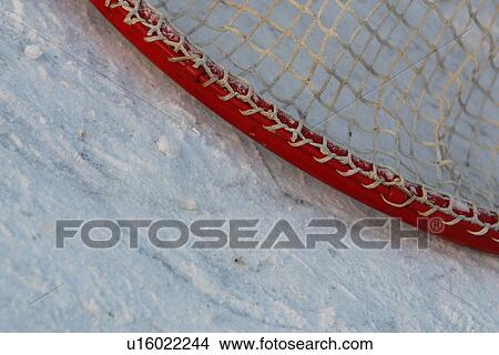 Picture - net, mesh, goal net, ice hockey goal, hockey goal, ice. Fotosearch