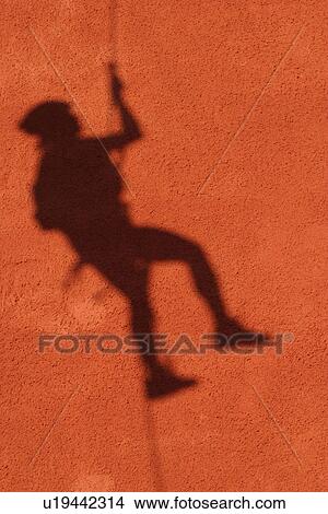 Picture - recreation, rescue, construction, grip, feet, shoes. Fotosearch