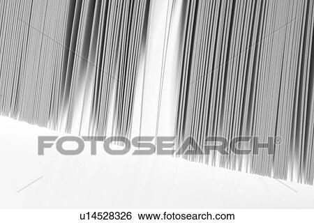 Stock Photograph - books, heap, sheets, paper sheets, note books, text books. Fotosearch