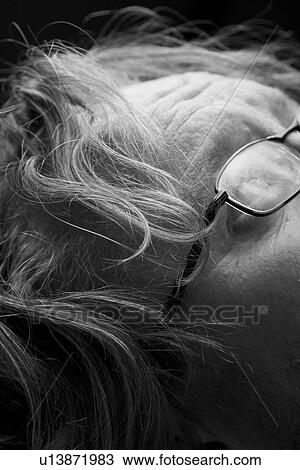 Black And White, Extreme Close-Up, Eyeglasses, Forehead, Human Face, Indoors View Large Photo Image Stock Image - Black And White, Extreme Close-Up, Eyeglasses, Forehead, Human Face, Indoors. Fotosearch