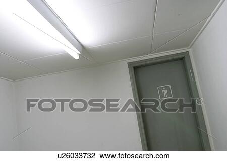 Stock Image - rest room sign, tube light, indoors, public rest room. Fotosearch