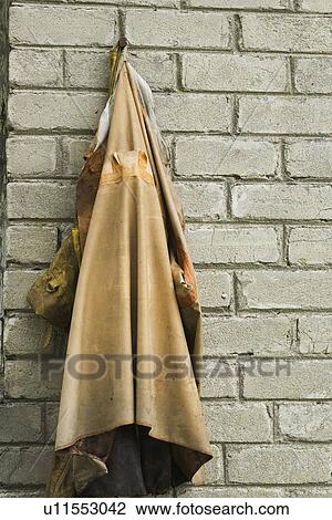 Stock Image - Brick Wall, Close-Up, Day, Discolored, Hanger. Fotosearch