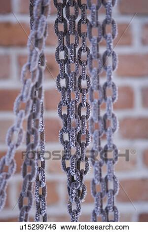 Stock Photograph - Brick Wall, Brown, Chain, Close-Up, Day. Fotosearch