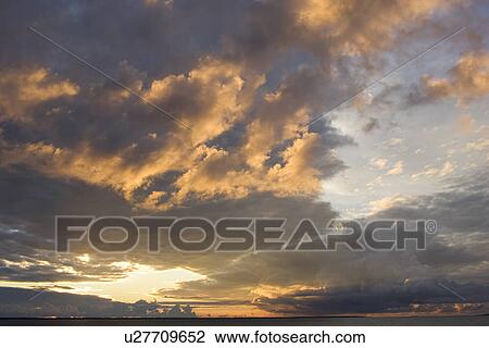 Stock Image - Cloud, Dusk, Generic Location, Horizon. Fotosearch
