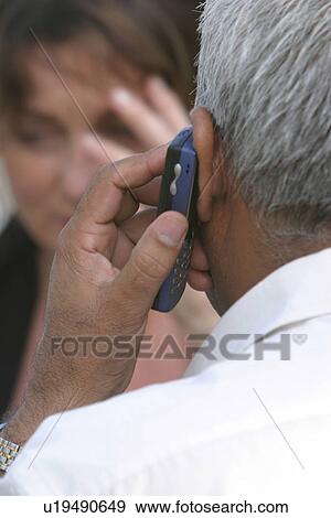 Stock Photo - Mobile, mobile phone, phone, wireless, wireless technology, communications. Fotosearch