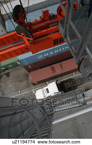 Picture - cargo, equipment, boxes, loading, unloading, arrangement. Fotosearch