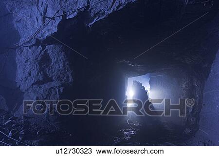 Stock Image - Blue, Earth Tones, Light, Machinery. Fotosearch