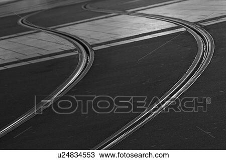 Stock Image - black and white, rail, railways, railway line, tram line, street. Fotosearch
