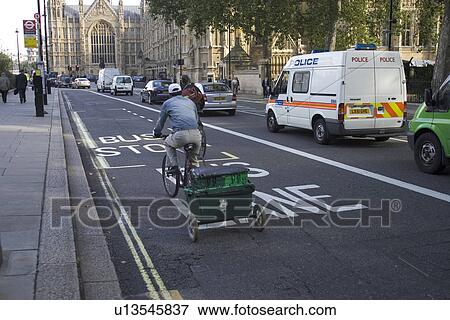 Building Exterior, Building Structure, Cap, Capital Letter, Cart, Casual Clothing View Large Photo Image Stock Photo - Building Exterior, Building Structure, Cap, Capital Letter, Cart, Casual Clothing. Fotosearch
