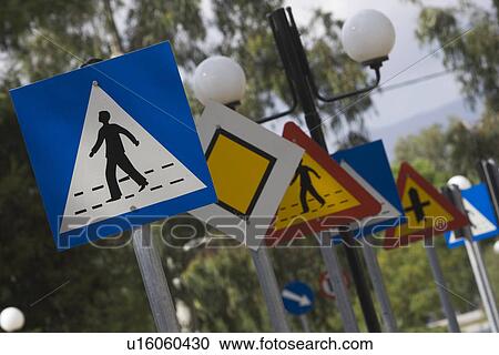 Close-Up, Crossing Sign, Day, Diamond Shape, Focus On Foreground View Large Photo Image Stock Image - Close-Up, Crossing Sign, Day, Diamond Shape, Focus On Foreground. Fotosearch