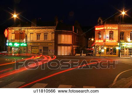Stock Photograph - dark, gloomy, lit, street, outdoors, way. Fotosearch
