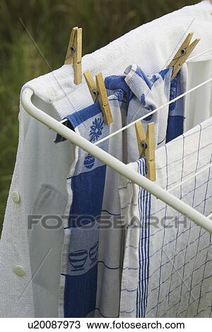 Stock Image - Button, Checked, Close-Up, Clothes, Clothes Peg, Clothesline. Fotosearch