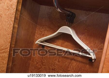 hanger, closet, close up, indoors View Large Photo Image Stock Photo - hanger, closet, close up, indoors. Fotosearch