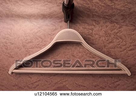 Stock Photography - metal, empty, hanger, clothes hanger, implement, device. Fotosearch