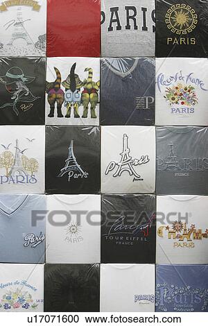 Stock Image - white, red, close-up, clothes, shirt, text. Fotosearch
